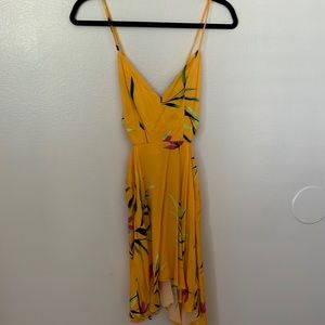 Strappy yellow dress with cut outs